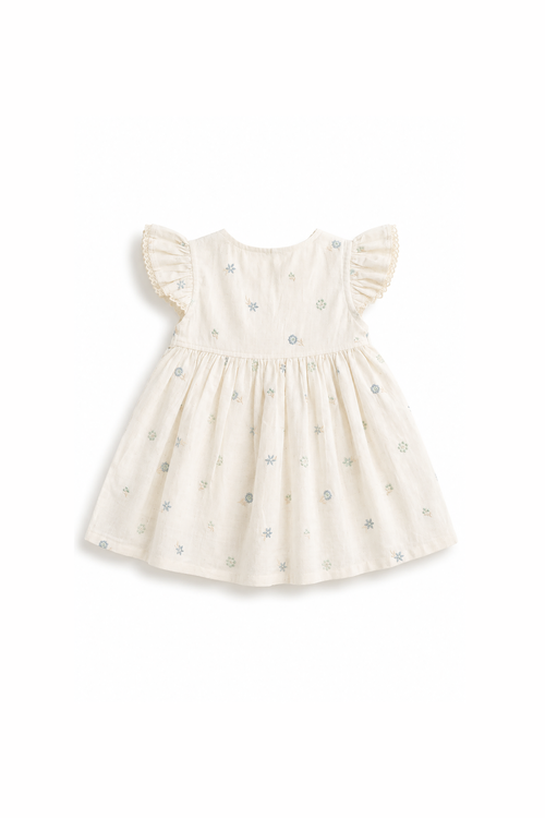 White baby dress with ruffled sleeves on a white background