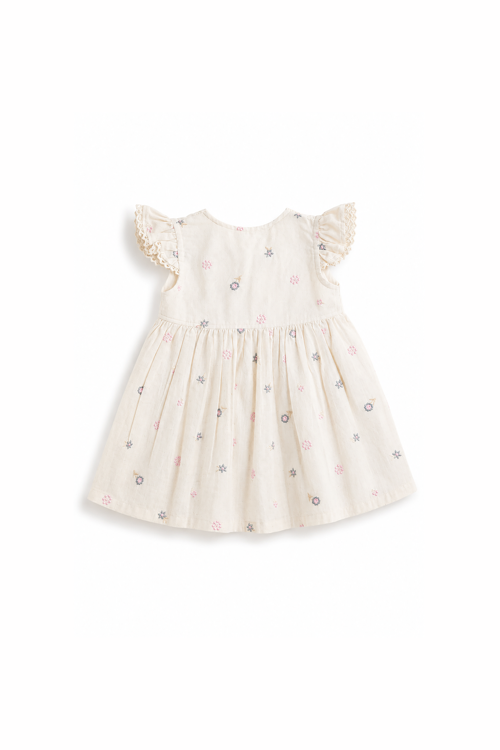 White baby dress with lace details on a white background